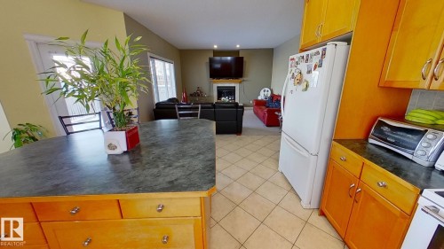 1604 Blackmore Court, Edmonton, AB - Indoor Photo Showing Other Room With Fireplace