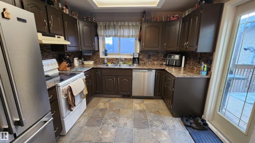 5101 58 Avenue, Elk Point, AB - Indoor Photo Showing Kitchen With Double Sink