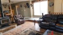 5101 58 Avenue, Elk Point, AB  - Indoor Photo Showing Living Room With Fireplace 