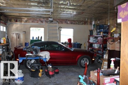 28 Silver Beach, Rural Wetaskiwin County, AB - Indoor Photo Showing Garage