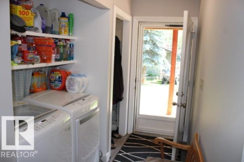28 Silver Beach, Rural Wetaskiwin County, AB - Indoor Photo Showing Laundry Room