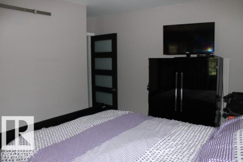 28 Silver Beach, Rural Wetaskiwin County, AB - Indoor Photo Showing Bedroom