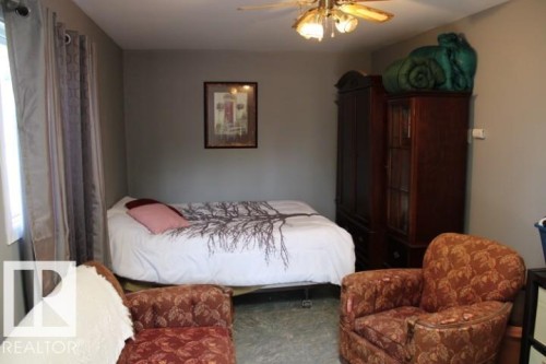28 Silver Beach, Rural Wetaskiwin County, AB - Indoor Photo Showing Bedroom