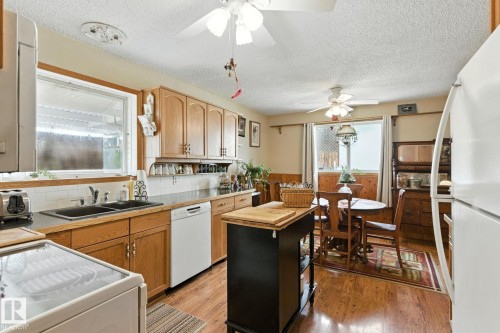 9608 98A Street, Morinville, AB - Indoor Photo Showing Kitchen With Double Sink