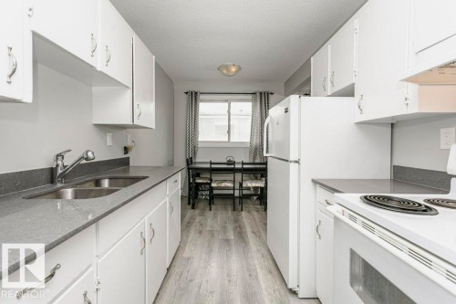 404 10320 113 Street, Edmonton, AB - Indoor Photo Showing Kitchen With Double Sink