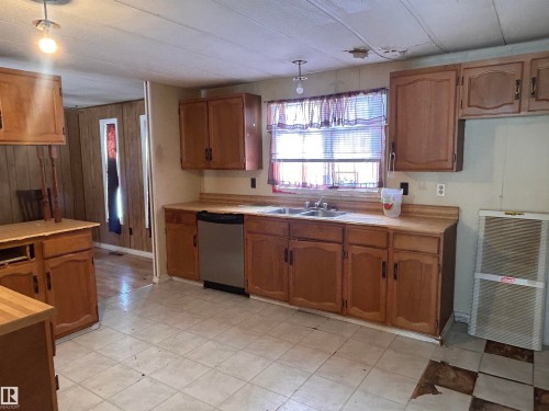 3260 Calling Lake Drive, Calling Lake, AB - Indoor Photo Showing Kitchen With Double Sink