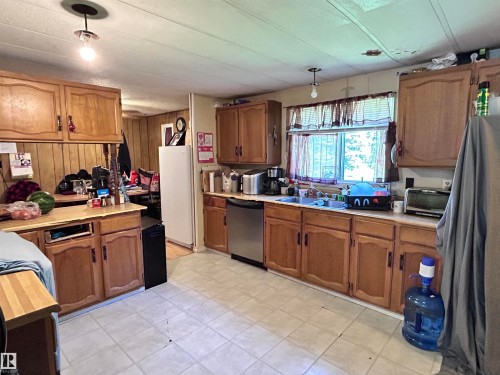 3260 Calling Lake Drive, Calling Lake, AB - Indoor Photo Showing Kitchen With Double Sink