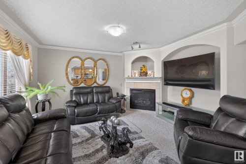 10671 180 Avenue, Edmonton, AB - Indoor Photo Showing Living Room With Fireplace