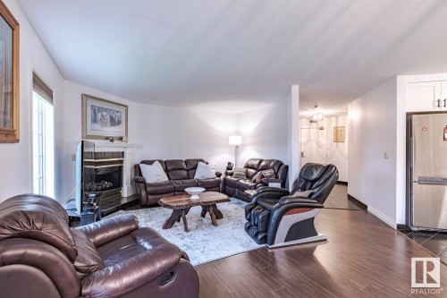 516 3 Perron Street, St. Albert, AB - Indoor Photo Showing Living Room With Fireplace