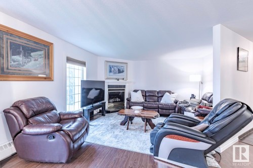 516 3 Perron Street, St. Albert, AB - Indoor Photo Showing Living Room With Fireplace