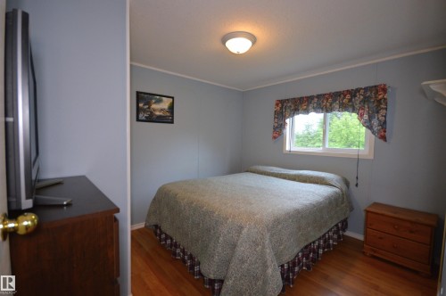 65001 Rge Rd 474, Rural Bonnyville M.D., AB - Indoor Photo Showing Bedroom