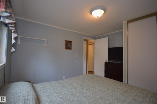 65001 Rge Rd 474, Rural Bonnyville M.D., AB - Indoor Photo Showing Bedroom