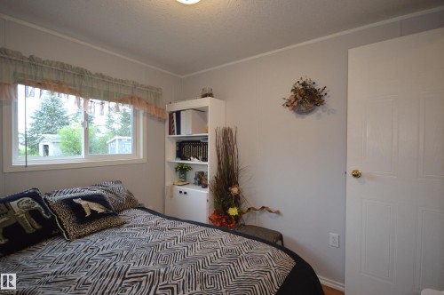 65001 Rge Rd 474, Rural Bonnyville M.D., AB - Indoor Photo Showing Bedroom