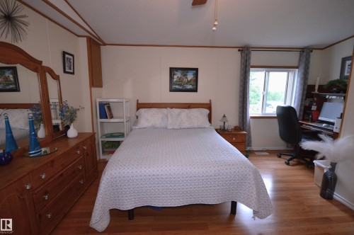 65001 Rge Rd 474, Rural Bonnyville M.D., AB - Indoor Photo Showing Bedroom