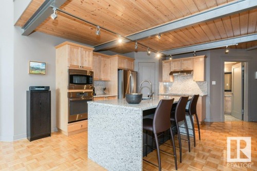 203 10009 102 Avenue, Edmonton, AB - Indoor Photo Showing Kitchen With Stainless Steel Kitchen
