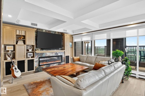 1601 10045 118 Street, Edmonton, AB - Indoor Photo Showing Living Room With Fireplace