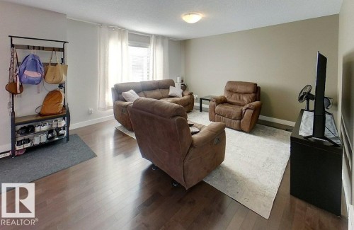 15 7289 South Terwillegar Drive, Edmonton, AB - Indoor Photo Showing Living Room