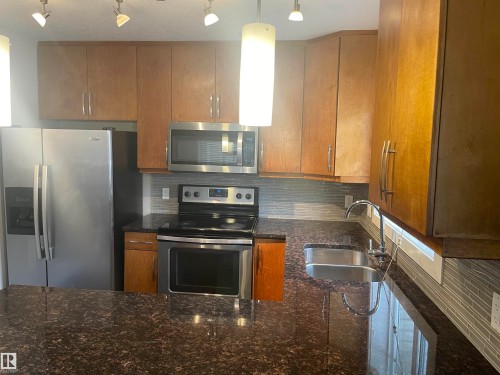15 7289 South Terwillegar Drive, Edmonton, AB - Indoor Photo Showing Kitchen With Double Sink