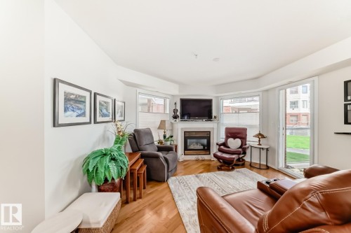 123 6703 172 Street, Edmonton, AB - Indoor Photo Showing Living Room With Fireplace