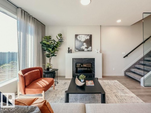 312 30 Street, Edmonton, AB - Indoor Photo Showing Living Room With Fireplace