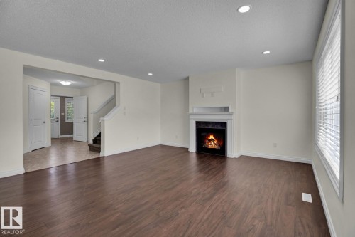 16540 131 Street, Edmonton, AB - Indoor Photo Showing Living Room With Fireplace
