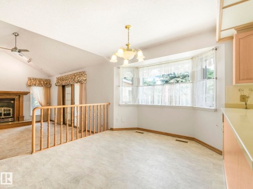 1820 Bearspaw Drive W, Edmonton, AB - Indoor Photo Showing Other Room With Fireplace