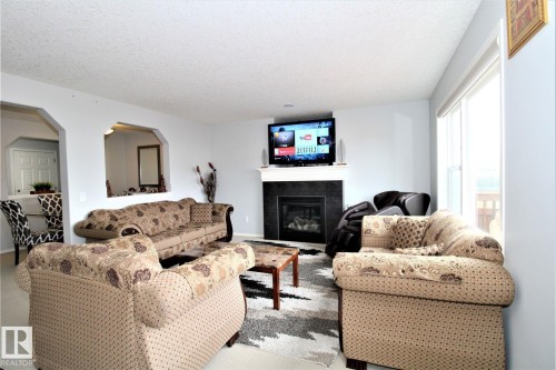 1218 37 Avenue Nw, Edmonton, AB - Indoor Photo Showing Living Room With Fireplace