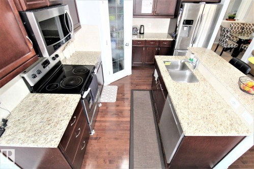 1218 37 Avenue Nw, Edmonton, AB - Indoor Photo Showing Kitchen With Double Sink
