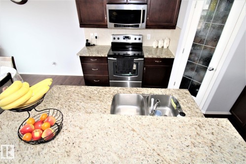 1218 37 Avenue Nw, Edmonton, AB - Indoor Photo Showing Kitchen With Double Sink
