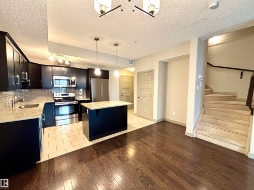 114 10510 56 Avenue, Edmonton, AB - Indoor Photo Showing Kitchen With Stainless Steel Kitchen With Upgraded Kitchen