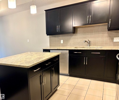 114 10510 56 Avenue, Edmonton, AB - Indoor Photo Showing Kitchen With Upgraded Kitchen