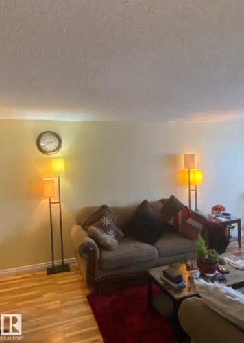207 8930 149 Street, Edmonton, AB - Indoor Photo Showing Living Room