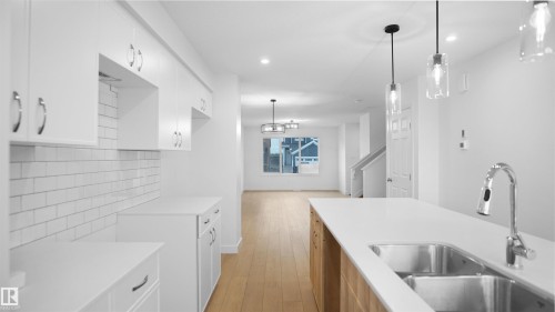 20931 16 Avenue, Edmonton, AB - Indoor Photo Showing Kitchen With Double Sink
