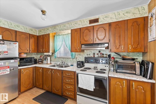 5240 53 Avenue, Wabamun, AB - Indoor Photo Showing Kitchen With Double Sink