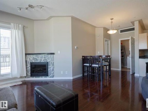 202 10707 102 Avenue, Edmonton, AB - Indoor Photo Showing Living Room With Fireplace
