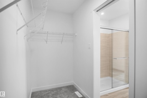 4 Ellis Link, Spruce Grove, AB - Indoor Photo Showing Other Room