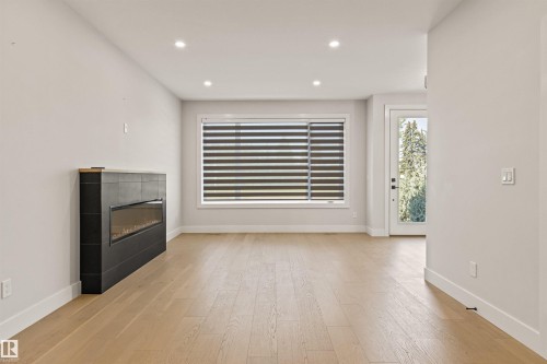 2 8343 Saskatchewan Drive, Edmonton, AB - Indoor With Fireplace
