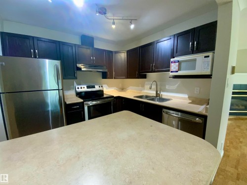 34 9914 80 Avenue, Edmonton, AB - Indoor Photo Showing Kitchen With Double Sink With Upgraded Kitchen