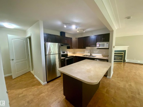 34 9914 80 Avenue, Edmonton, AB - Indoor Photo Showing Kitchen With Double Sink