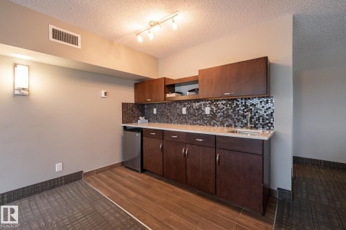 116 4008 Savaryn Drive, Edmonton, AB - Indoor Photo Showing Other Room