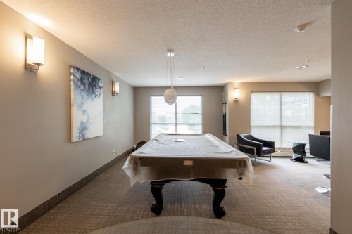 116 4008 Savaryn Drive, Edmonton, AB - Indoor Photo Showing Other Room