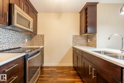 116 4008 Savaryn Drive, Edmonton, AB - Indoor Photo Showing Kitchen With Double Sink With Upgraded Kitchen