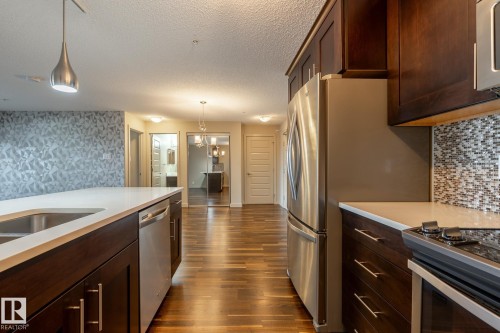 116 4008 Savaryn Drive, Edmonton, AB - Indoor Photo Showing Kitchen With Upgraded Kitchen