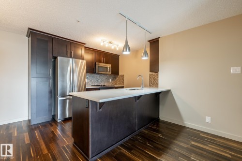 116 4008 Savaryn Drive, Edmonton, AB - Indoor Photo Showing Kitchen With Upgraded Kitchen