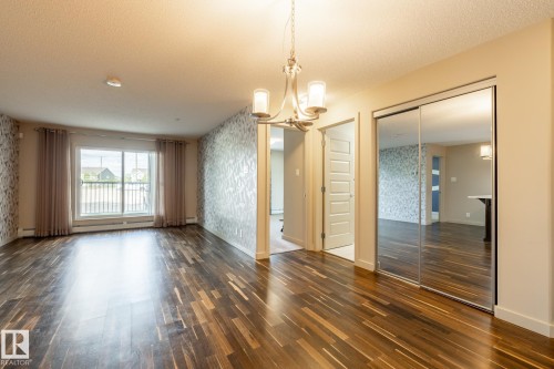 116 4008 Savaryn Drive, Edmonton, AB - Indoor Photo Showing Other Room