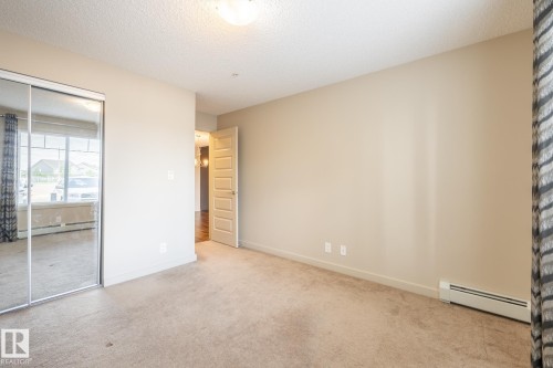 116 4008 Savaryn Drive, Edmonton, AB - Indoor Photo Showing Other Room