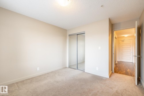 116 4008 Savaryn Drive, Edmonton, AB - Indoor Photo Showing Other Room