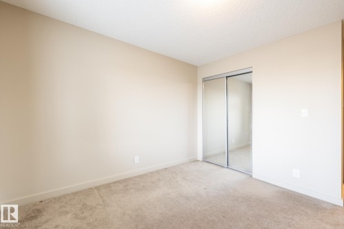 116 4008 Savaryn Drive, Edmonton, AB - Indoor Photo Showing Other Room