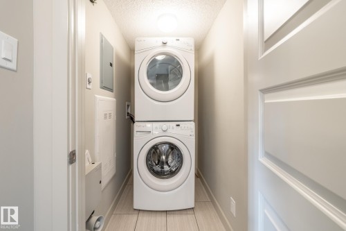116 4008 Savaryn Drive, Edmonton, AB - Indoor Photo Showing Laundry Room
