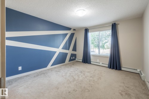 116 4008 Savaryn Drive, Edmonton, AB - Indoor Photo Showing Other Room